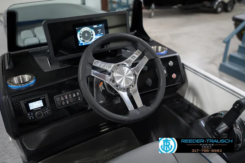 Slide: The Image of Steering console of 2026 Bennington 22 MFB boat with modern controls and display. - 36