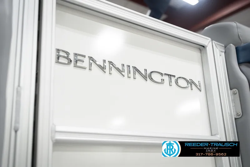 Slide: The Image of 2026 Bennington 22 MFB boat interior with logo detail, featuring sleek design elements. - 60