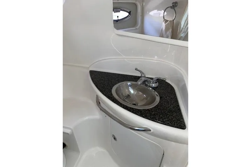 Slide: The Image of 2007 Chaparral 330 Signature boat bathroom with sink and countertop. - 21