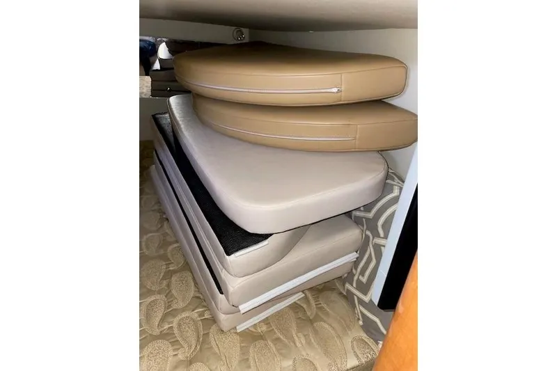 Slide: The Image of Cushions stacked inside 2007 Chaparral 330 Signature boat interior. - 25