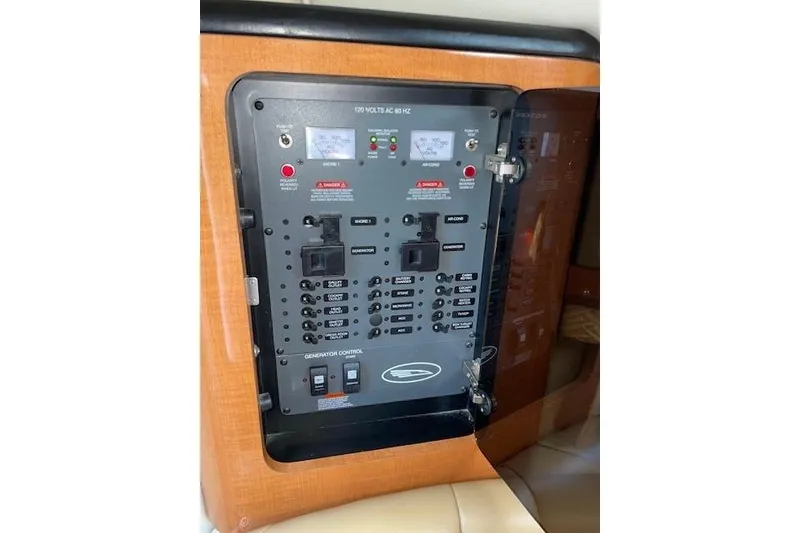 Slide: The Image of Electrical control panel inside 2007 Chaparral 330 Signature boat cabin. - 27