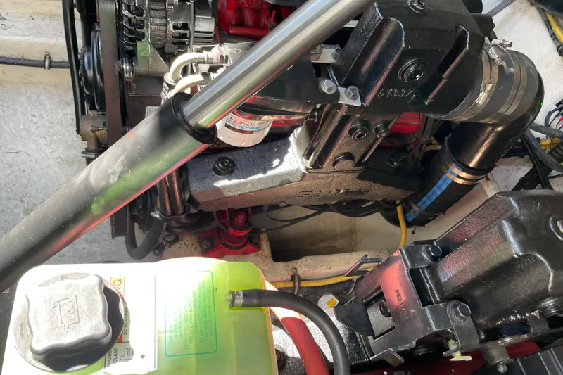 Slide: The Image of Engine compartment of a 2007 Chaparral 330 Signature boat, showcasing mechanical components. - 31