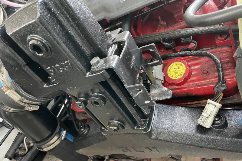 Slide: The Image of Close-up of a 2007 Chaparral 330 Signature engine component with visible oil cap. - 32