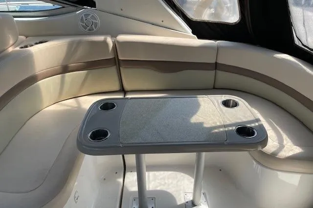 Slide: The Image of Interior of 2007 Chaparral 330 Signature boat with cushioned seating and table. - 5