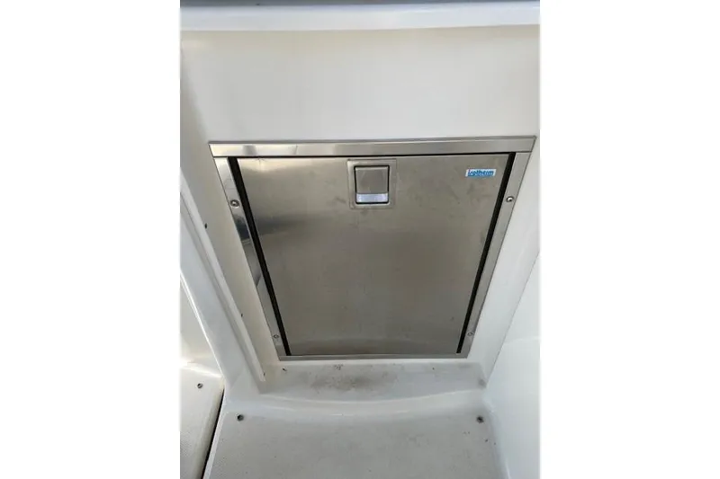 Slide: The Image of Stainless steel hatch on 2007 Chaparral 330 Signature boat interior. - 7