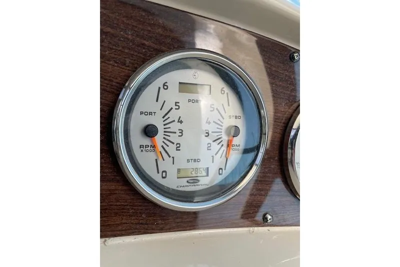 Slide: The Image of Close-up of 2007 Chaparral 330 Signature boat tachometer on wooden dashboard. - 8