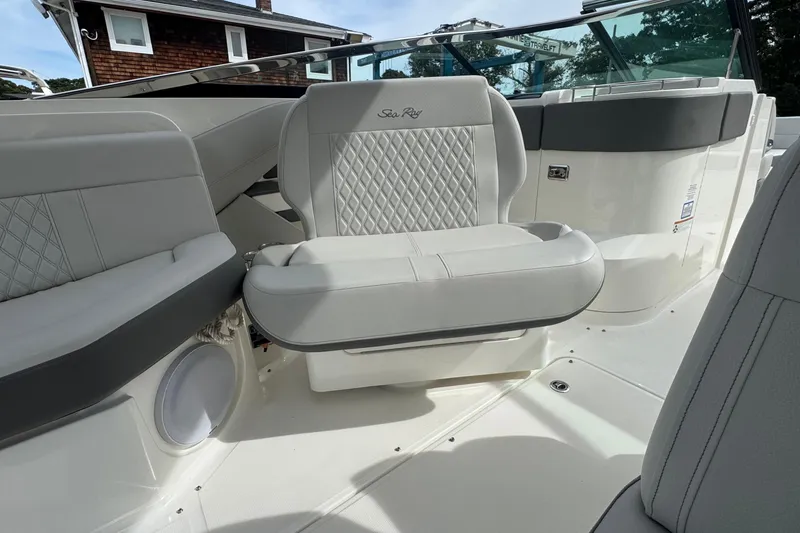 Slide: The Image of Luxurious seating on 2021 Sea Ray 310 SLX boat with elegant design and premium materials. - 23