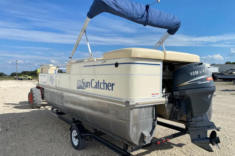 Slide: The Image of 2004 G3 SunCatcher LX 20 Cruise pontoon boat with Yamaha outboard motor on trailer. - 3