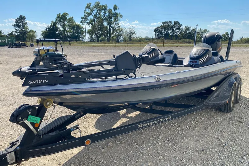 Slide: The Image of 2018 Ranger Z520 Comanche Ranger Cup boat on trailer, equipped with Garmin technology. - 2