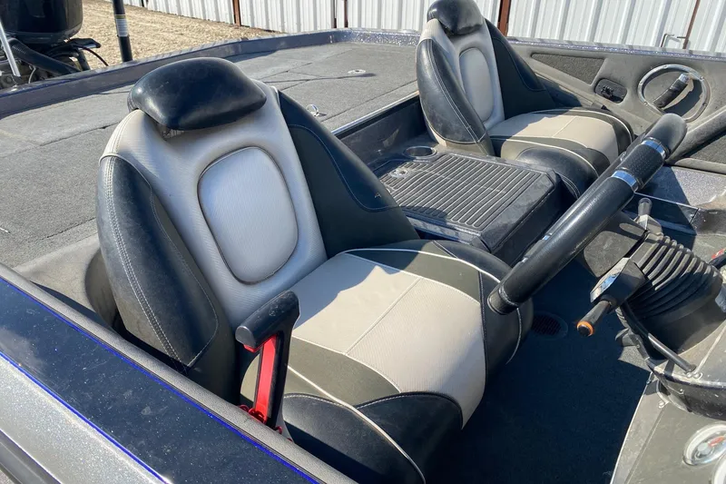 Slide: The Image of 2018 Ranger Z520 Comanche Ranger Cup boat interior with dual seats and steering wheel. - 7