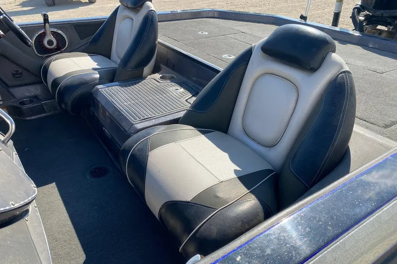 Slide: The Image of 2018 Ranger Z520 Comanche Ranger Cup boat interior with dual seats and steering wheel. - 8