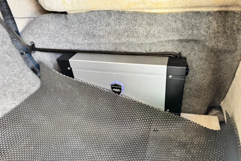 Slide: The Image of Audio amplifier in a 2015 Chaparral Vortex 203 VRX boat interior. - 26