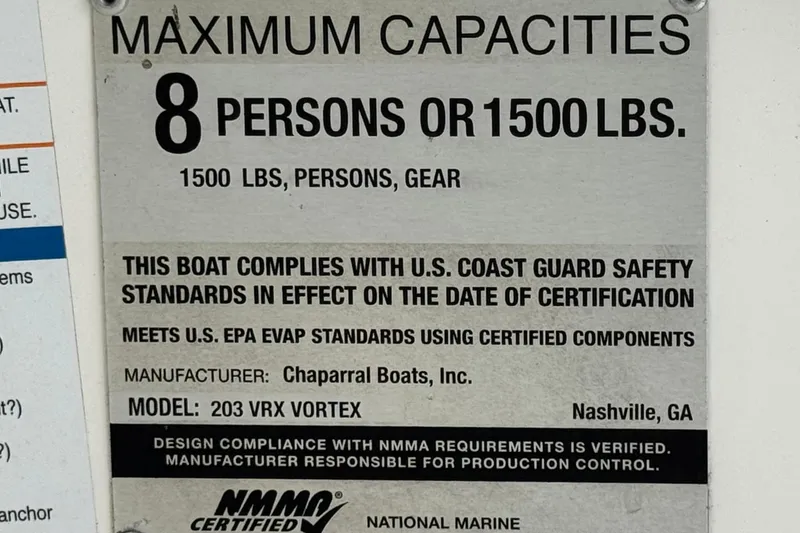 Slide: The Image of 2015 Chaparral Vortex 203 VRX capacity plate, 8 persons or 1500 lbs, safety compliance. - 32