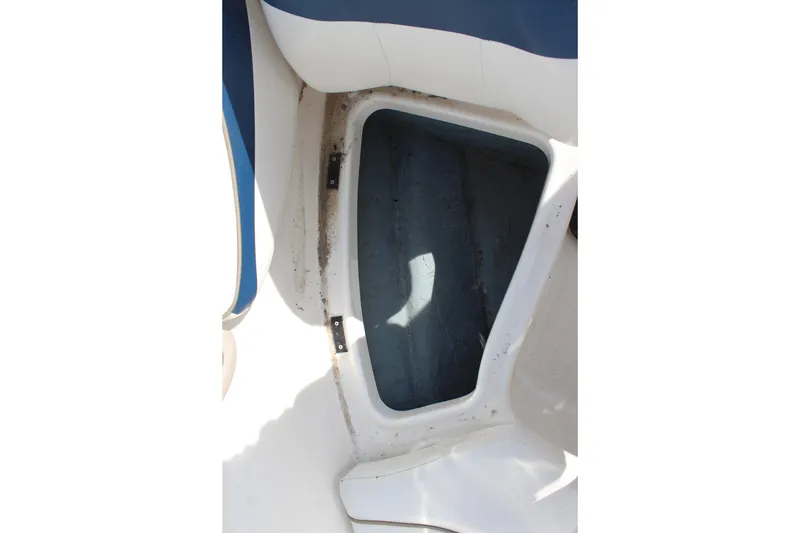 Slide: The Image of Open storage compartment in 2002 Bayliner 1950 Capri Classic boat. - 26