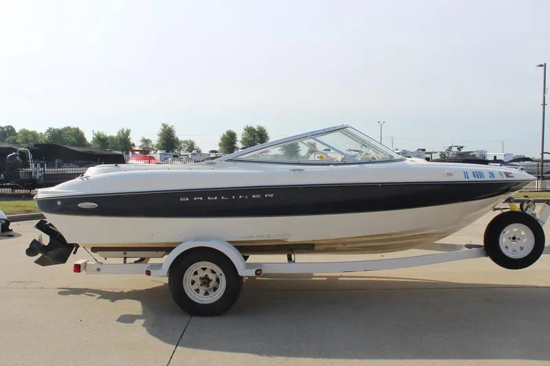 Slide: The Image of 2002 Bayliner 1950 Capri Classic boat on trailer, side view. - 4