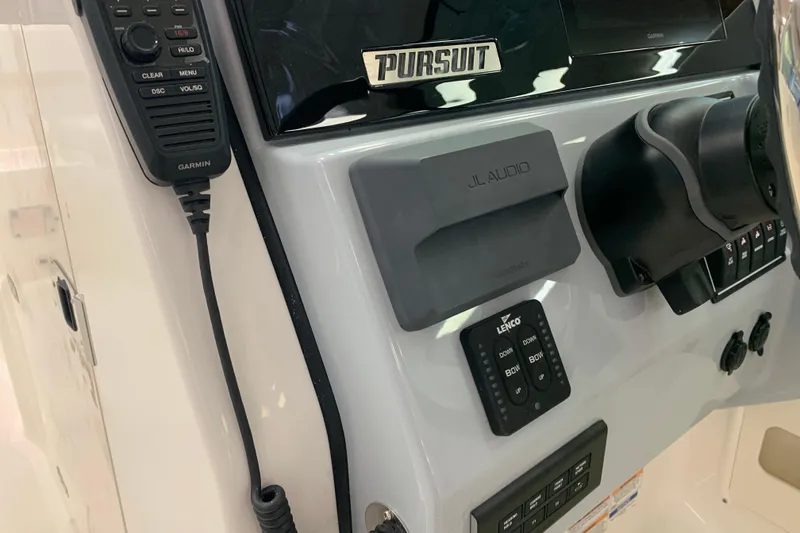 Slide: The Image of Control panel of 2025 Pursuit DC 266 Dual Console with Garmin and JL Audio systems. - 22