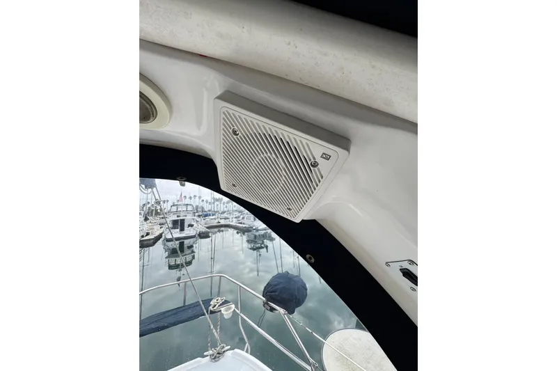 Slide: The Image of Speaker on 1999 Hunter Passage 420 sailboat with marina view in background. - 20