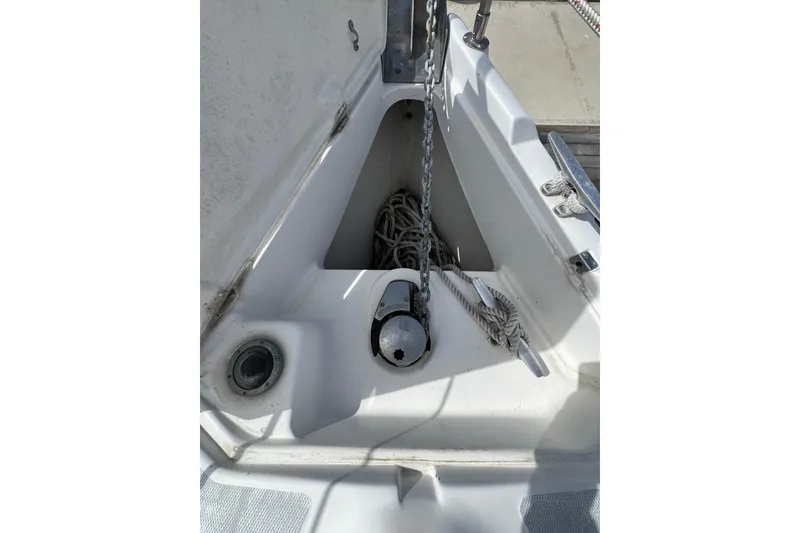 Slide: The Image of Anchor locker of 1999 Hunter Passage 420 sailboat with chain and rope. - 5