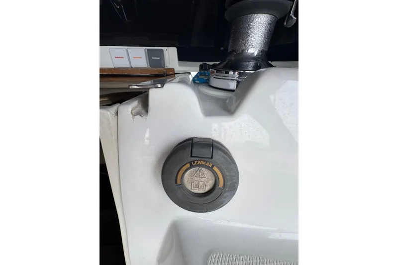 Slide: The Image of Close-up of a 1999 Hunter Passage 420 boat component with a Lewmar winch. - 84