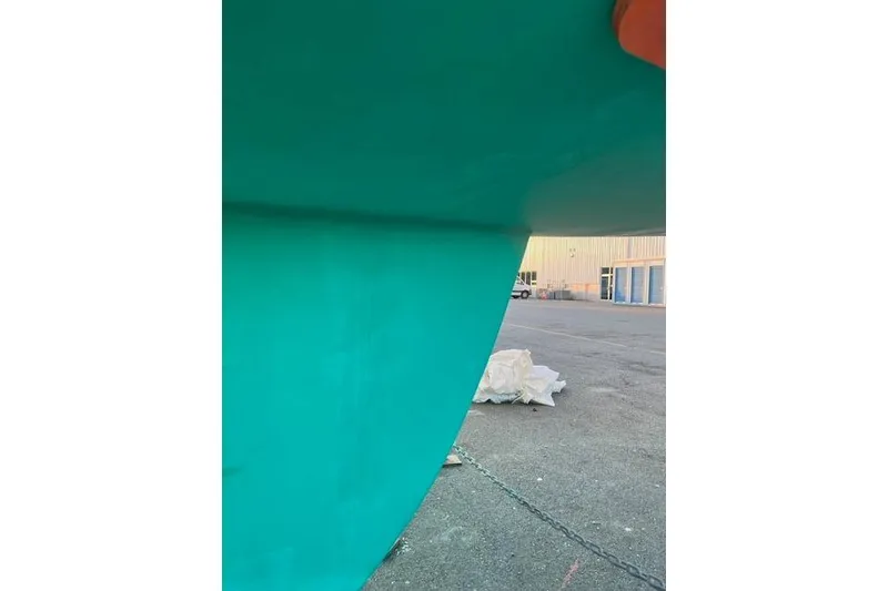 Slide: The Image of Close-up of 1998 Beneteau Oceanis 352 keel in a shipyard. - 42