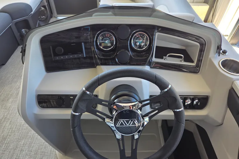 Slide: The Image of 2026 Avalon LSZ 2185 Cruise Rear Bench dashboard with steering wheel and controls. - 10