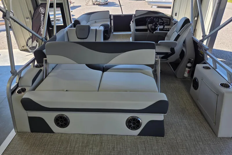 Slide: The Image of 2026 Avalon LSZ 2185 Cruise Rear Bench interior with modern seating and steering console. - 11