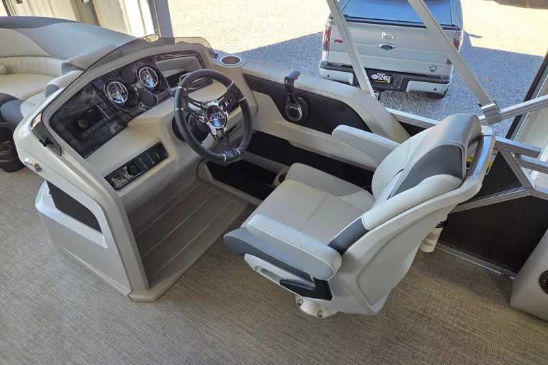 Slide: The Image of 2026 Avalon LSZ 2185 Cruise Rear Bench boat interior with modern helm and comfortable seating. - 9