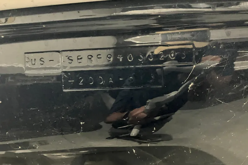 Slide: The Image of Hull identification number on a 2003 Sea Ray 420 Sundancer boat. - 14