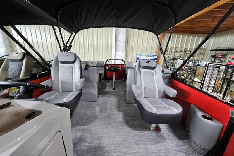 Slide: The Image of 2026 Starcraft EXS 3 boat interior with modern seating and canopy. - 9