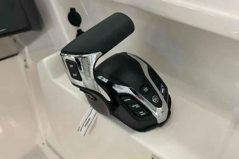 Slide: The Image of Throttle control of 2025 Pursuit DC 246 Dual Console boat, featuring modern design and functionality. - 24