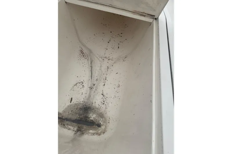 Slide: The Image of Dirty compartment interior of 2004 Fountain 31 Sportfish CC Open Bow boat. - 12