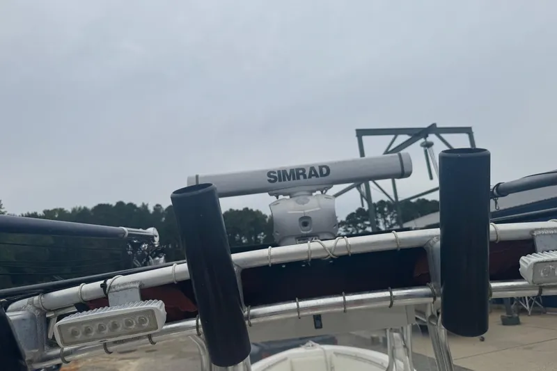 Slide: The Image of 2004 Fountain 31 Sportfish CC Open Bow with Simrad radar system. - 15