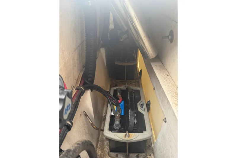 Slide: The Image of Battery compartment of a 2004 Fountain 31 Sportfish CC Open Bow boat. - 18