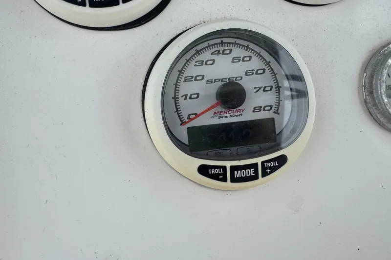 Slide: The Image of Speedometer of 2004 Fountain 31 Sportfish CC Open Bow boat, displaying Mercury SmartCraft. - 20