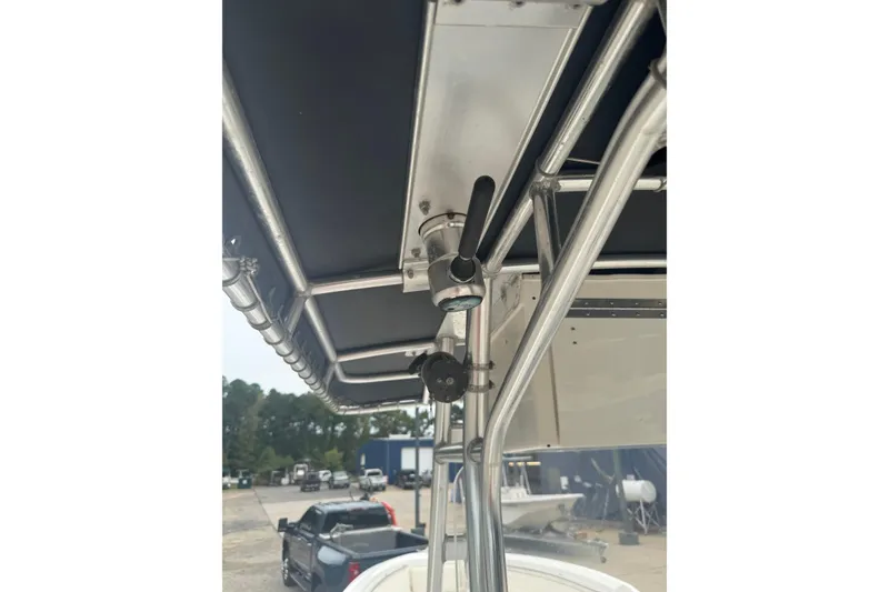 Slide: The Image of Close-up of 2004 Fountain 31 Sportfish CC Open Bow's T-top frame and fittings. - 23