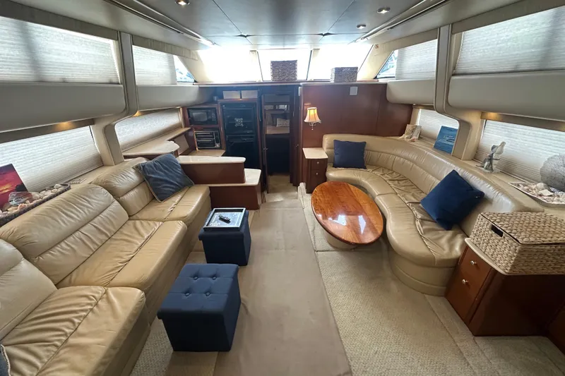 Slide: The Image of Luxurious interior of a 2005 Meridian 459 Motoryacht with beige leather seating and elegant decor. - 17