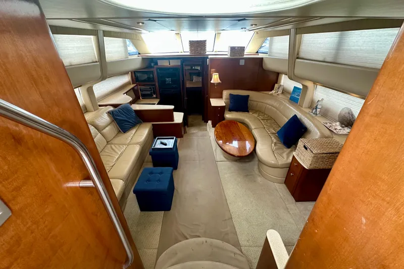 Slide: The Image of Luxurious interior of 2005 Meridian 459 Motoryacht with leather seating and wooden accents. - 18