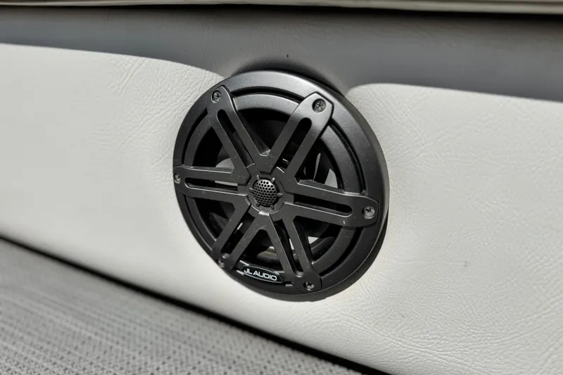 Slide: The Image of Speaker on 2021 Manitou 25 LX SHP boat, featuring JL Audio design. - 17