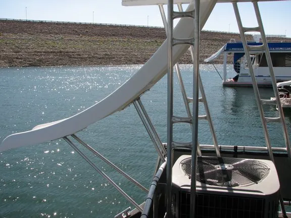 Slide: The Image of Houseboat with slide on a sunny lake, Sumerset Solar Express 2007. - 12