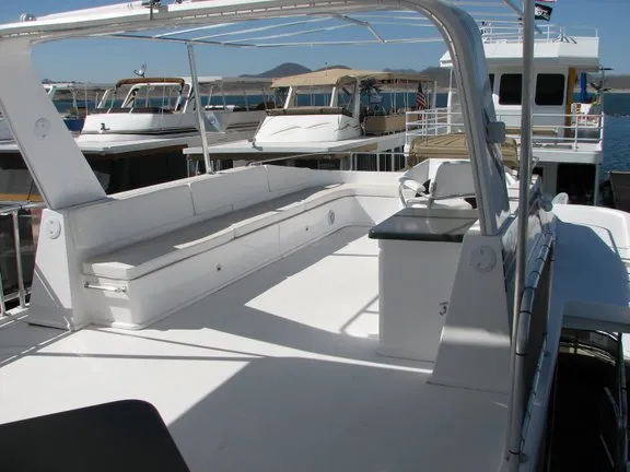 Slide: The Image of 2007 Sumerset Solar Express houseboat with spacious deck and seating area. - 13