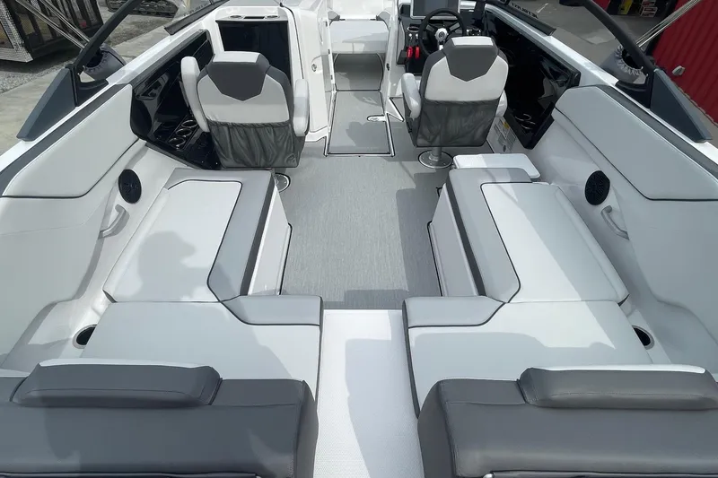 Slide: The Image of 2024 Yamaha Boats SX250 interior with modern seating and sleek design. - 8