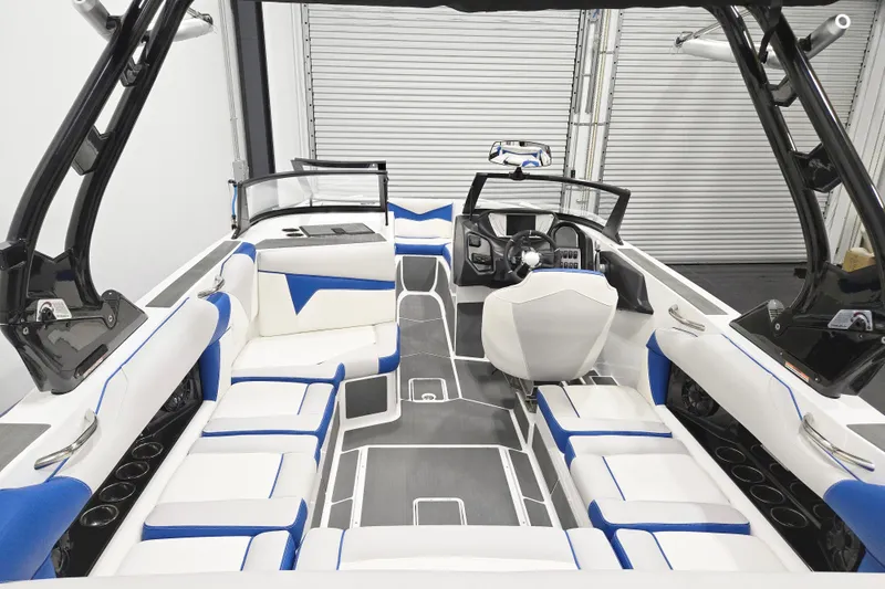 Slide: The Image of 2026 Supreme S220 boat interior with modern seating and sleek design. - 6