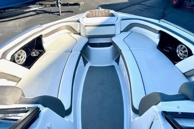 Slide: The Image of 2015 Yamaha Boats 242 Limited S interior with spacious seating and modern design. - 16