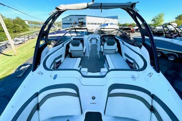 Slide: The Image of 2015 Yamaha Boats 242 Limited S, spacious interior, sleek design, outdoor display. - 6