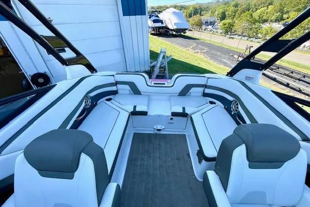 Slide: The Image of 2015 Yamaha Boats 242 Limited S interior with spacious seating and modern design. - 7