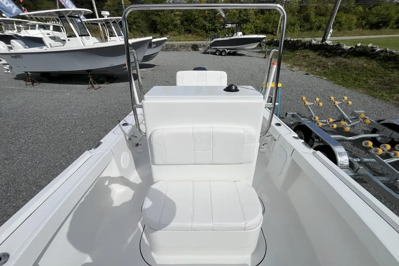 Slide: The Image of Parker 180 Coastal 2026 boat livewell with open lid, showcasing interior design. - 8