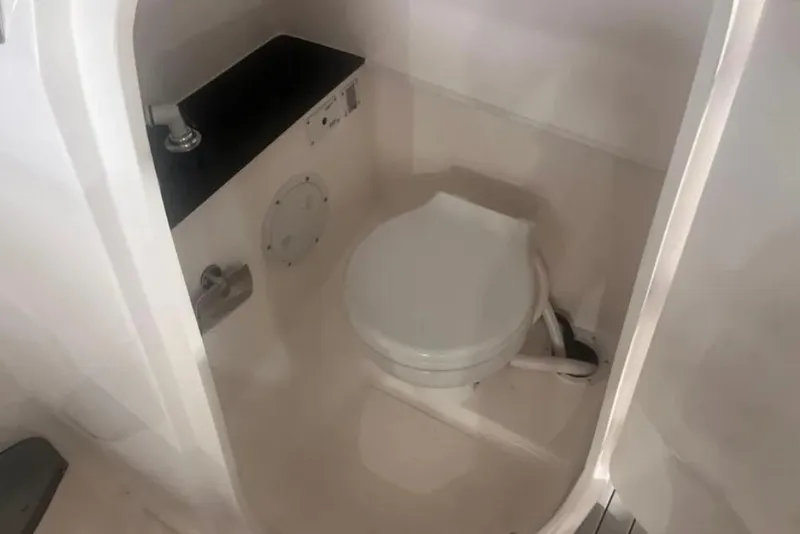 Slide: The Image of Compact bathroom in 2025 Ventura model, featuring a toilet and sink. - 4