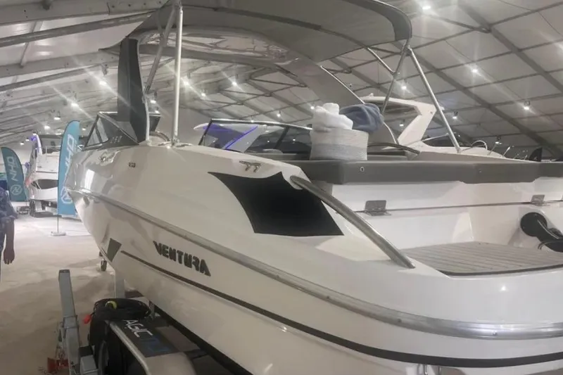 Slide: The Image of 2025 Ventura boat displayed indoors, showcasing sleek design and modern features. - 5