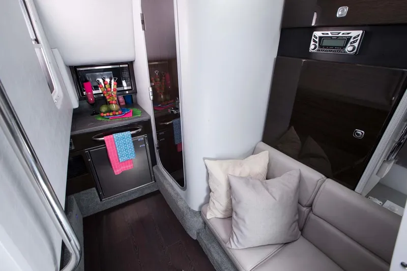 Slide: The Image of 2018 Formula 350 Crossover Bowrider OB interior with luxurious seating and sleek design. - 18