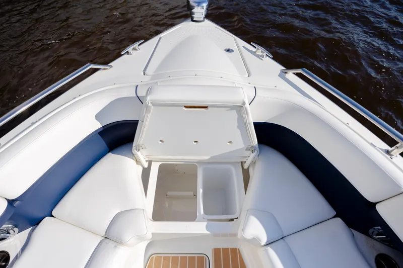 Slide: The Image of 2018 Formula 350 Crossover Bowrider OB, spacious bow seating, white and blue upholstery. - 29